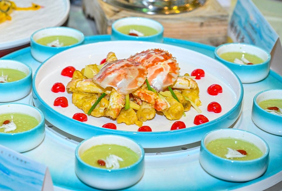 Stir fried flower crab with scallions and ginger